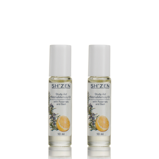Two bottles of Sh'zen Study Aid AromaMemory Oil on a white background